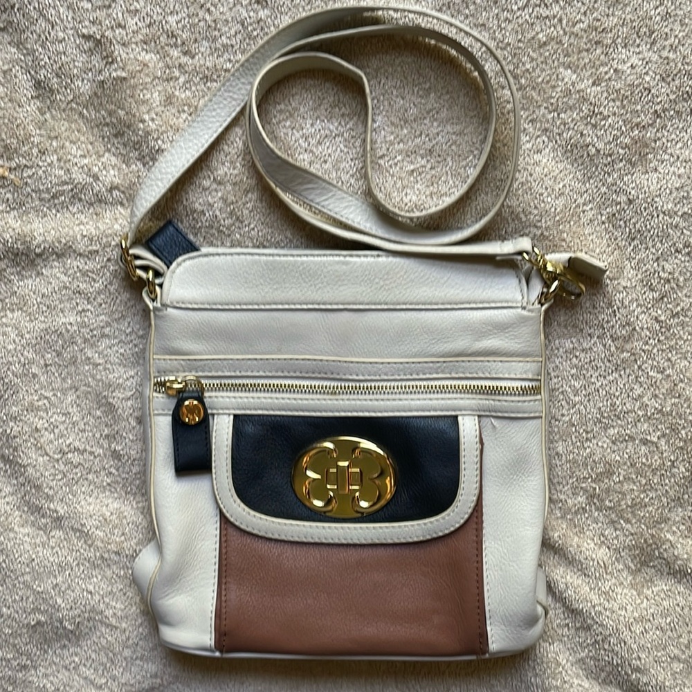 Emma Fox Beige Leather Crossbody purse with Black and Brown accent colors.